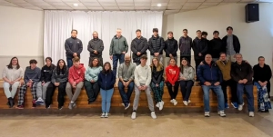 Participants of the Midnight Run to feed the homeless from Saint Basil Academy and Saints Constantine and Helena standing in two rows