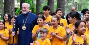 Archbishop Elpidophoros with youth at Camp Saint Paul