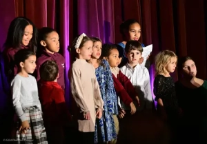 Students of all ages in a Christmas play