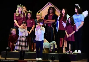 Students of all ages in a Christmas play