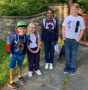 Saint Basil Academy children with their backpacks ready for a new school year.