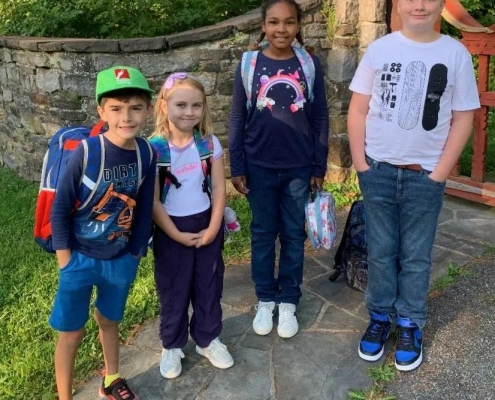 Saint Basil Academy children with their backpacks ready for a new school year.