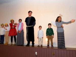Children and youth of Saint Basil Academy performing a Nativity pageant