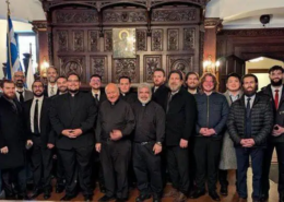 A group from Hellenic College Holy Cross with Father Costa and Deacon Kyriakos inside Saint Basil Academy