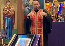 Father Nikolas Delaveris speaking during a paraklesis service at Saint Basil Chapel