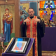 Father Nikolas Delaveris speaking during a paraklesis service at Saint Basil Chapel
