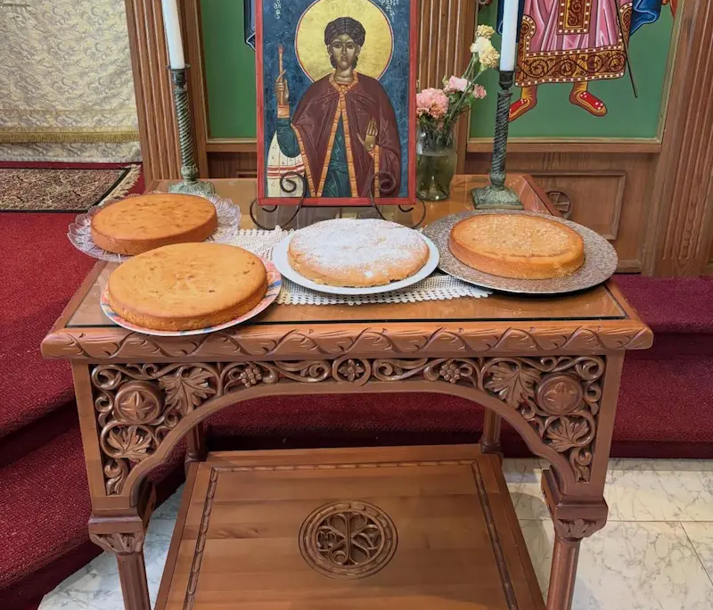 Phanouropita for paraklesis to Saint Phanourios Loaves of bread, or Phanouropita, on a table with an icon for a paraklesis to Saint Phanourios.
