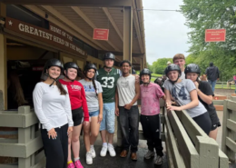 Youth at Rocking Horse Ranch Saint Basil Academy youth at on a trip to Rocking Horse Ranch standing outside the stables.