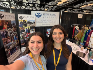 Ms. Gav and Ms. Josephine at the Saint Basil table at the Clergy-Laity Congress