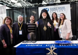The Saint Basil Academy table at Clergy Laity Conference 2026 Saint Basil staff at Clergy Laity Conference with Archbishop Elpidophoros