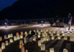 Overdose Awareness Remembrance Night Illuminaries on a patio for an Overdose Awareness Remembrance Night that Saint Basil staff participated in