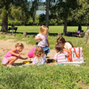 Five young girls playing in the sand on the Saint Basil Academy campus.