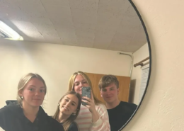 Saint Basil youth Four Saint Basil Academy high schoolers posing in a mirror for a selfie