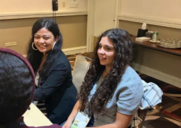 2026 Annual Concordia Summit Two young lady participants sitting at the 2026 Annual Concordia Summit